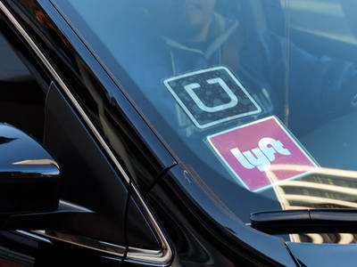 Uber and Lyft pledge $60 million to ballot measure in fight to keep drivers’ classification as contractors