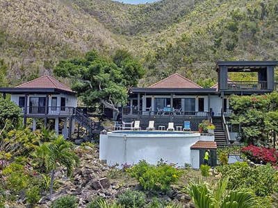 Immerse Yourself in an Oceanfront Villa Surrounded by Tropical Gardens