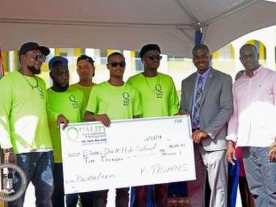 Contractors deliver on promise to donate $40K to ESHS