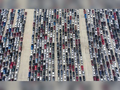 The poorest: People waiting in their cars on Thursday for the San Antonio Food Bank in Texas