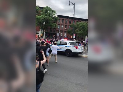 A shocking video shows NYPD squad cars ramming into George Floyd protesters behind a barricade in New York
