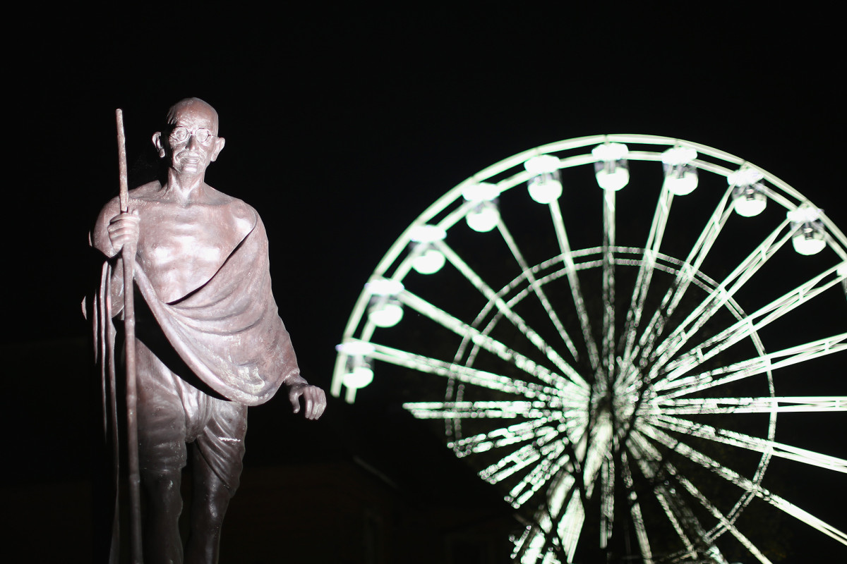 A statue of Mahatma Gandhi in Leicester illuminated for the Hindu festival of Diwali in 2015.
