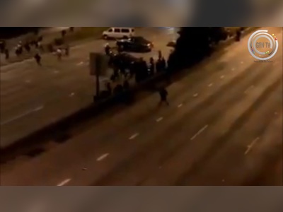 Two Seattle protesters just got run over by a jaguar (RAW VIDEO WARNING)