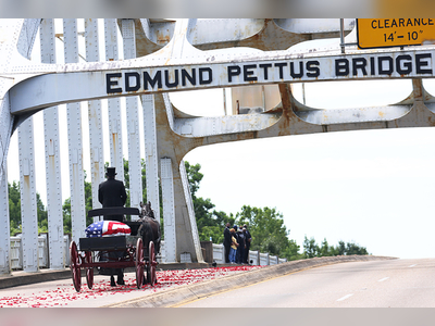 Moving Photos Show John Lewis Being Carried Over The Edmund Pettus Bridge For The Last Time