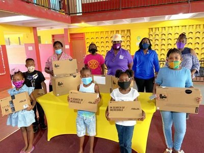 Rotary partners up to donate 14 student laptops
