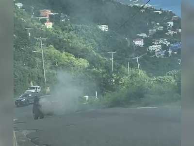 Vehicle catches afire ascending Great Mountain Road