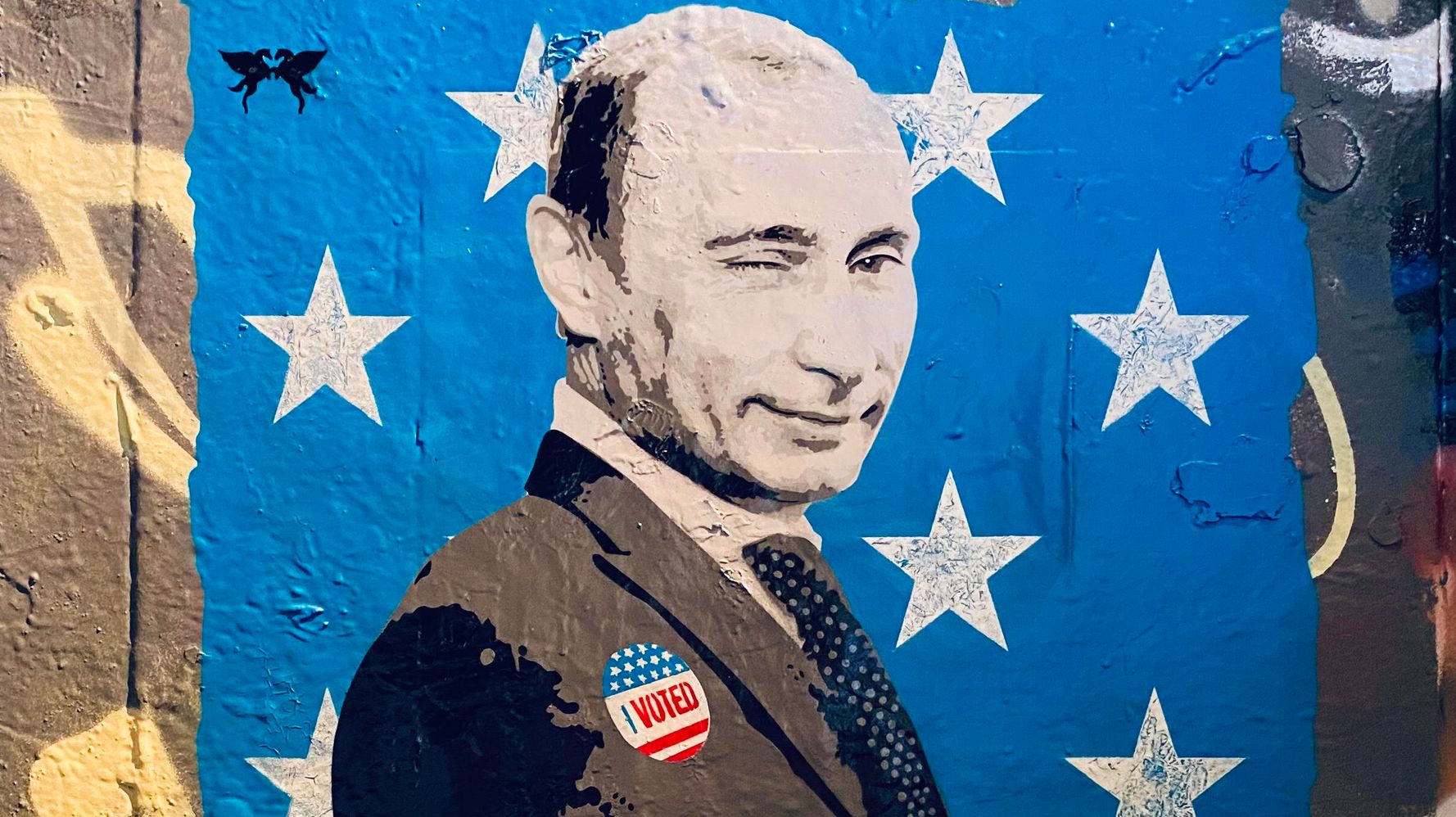 Winking Putin Gets 'I Voted' Sticker In Election Day Street Art