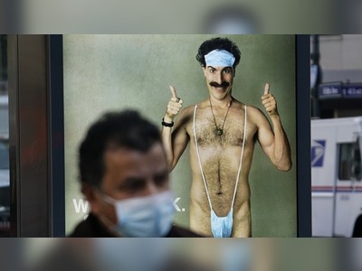 French muslims enraged by Borat bus posters featuring mankini-clad character wearing ‘Allah’ ring