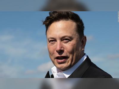 Elon Musk warns employees Tesla's stock could 'get crushed like a soufflé under a sledgehammer'