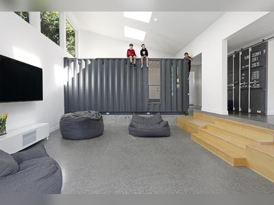 A Seattle Family Tucks Two Shipping Containers Inside Their 1950s Home