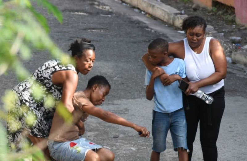 Frustrated Jamaican mom kicks son’s corpse after police shootout