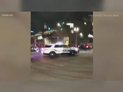 Video shows Tacoma police vehicle driving over at least one person on a crowded street
