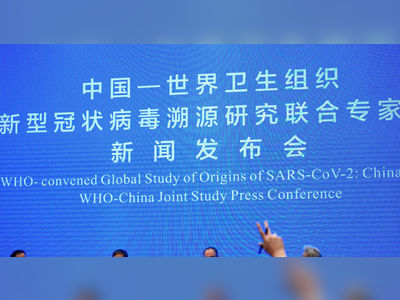 WHO COVID-19 Origins Report Finds Wuhan Lab Leak Conspiracy Theory ‘Extremely Unlikely’