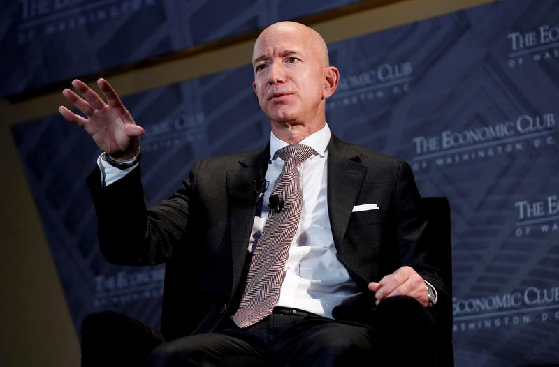 Bezos, Musk top Forbes' record-setting billionaire list