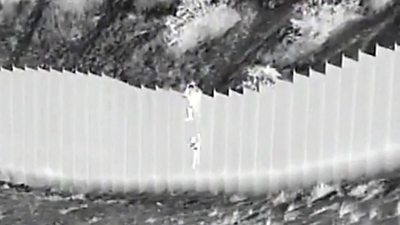 Children dropped over US border wall