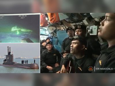 Last video inside doomed submarine shows crew members singing goodbye song