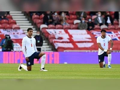 Euro 2020: Football's coming home, but taking a knee divides England fans