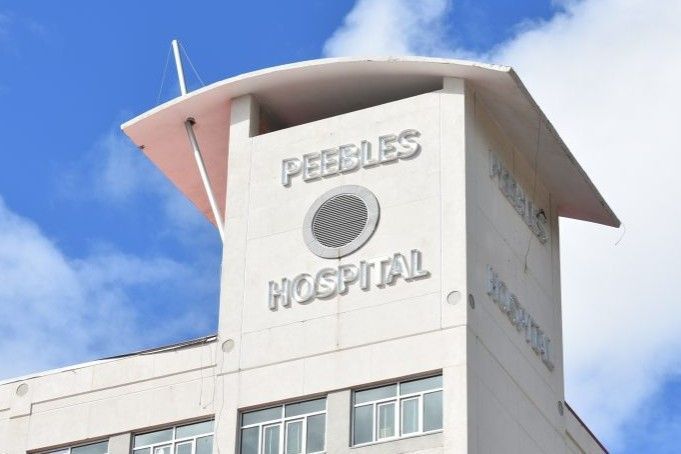 Gov’t refinances Peebles Hospital loan & realises $1.6M in savings