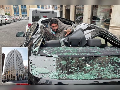 Man plunges nine stories from NJ high-rise, lands on BMW — and survives