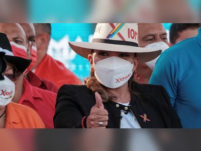 Honduran leftist, teamed with TV host, gains in race to be first woman president