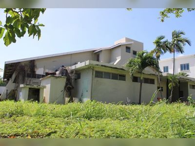 Abandoned ‘Cultural Centre’ serving as 'home' for mentally challenged person?