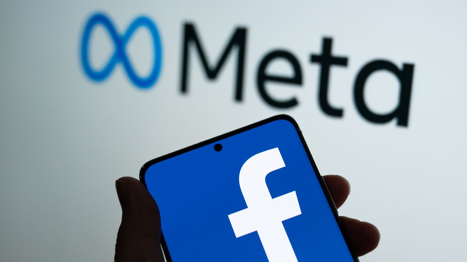 Facebook owner Meta reports first ever revenue drop amid lower advertising sales and competition from TikTok