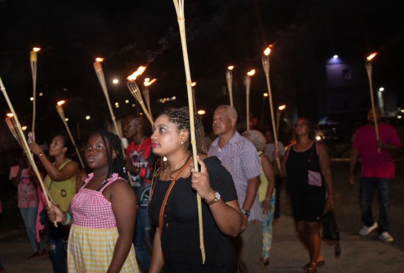 Tradition torchlight parade lights up RT as part of Emancipation 2022