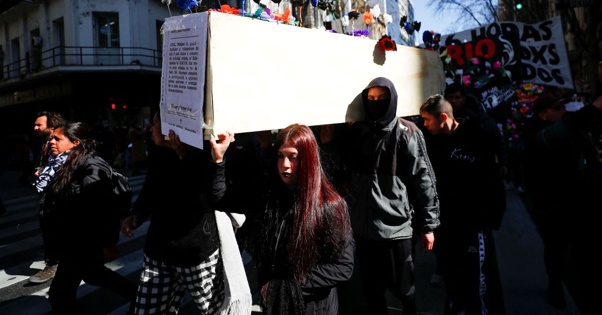 'The paycheck has died': Argentine workers hold funeral for wages