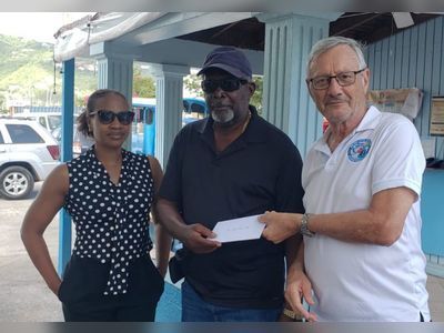 Rotary Club Grand Raffle 2nd place winner receives $5K cheque