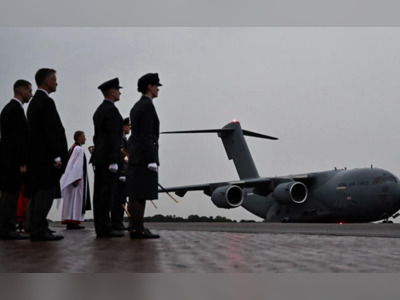Plane Carrying Queen Elizabeth's Coffin Arrives In London