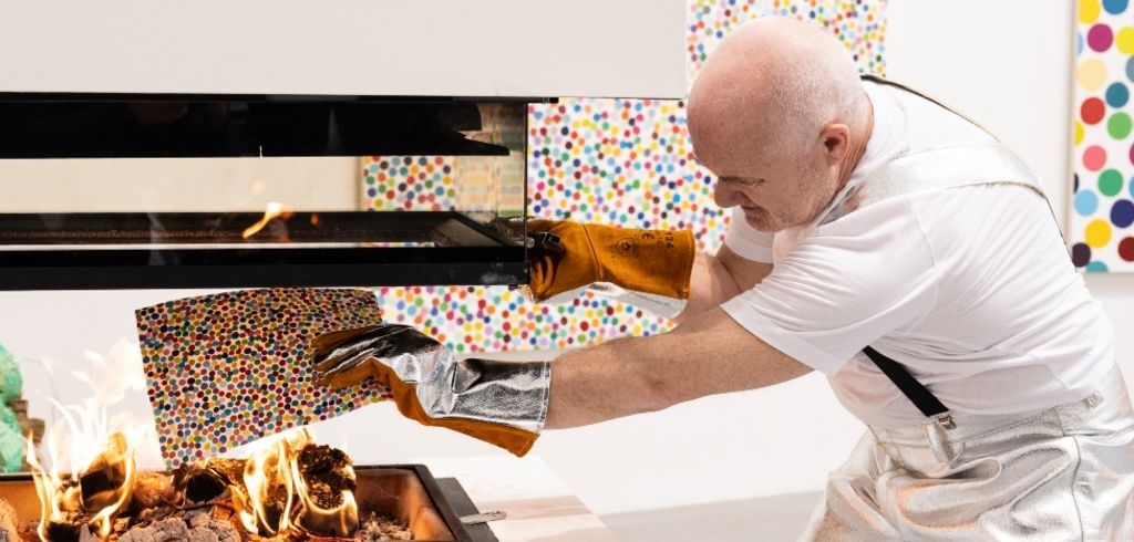 Damien Hirst burns his own art after selling NFTs