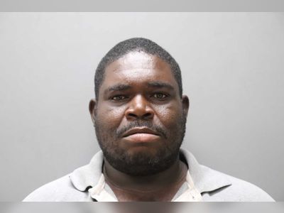 Man charged after allegedly assaulting woman over water