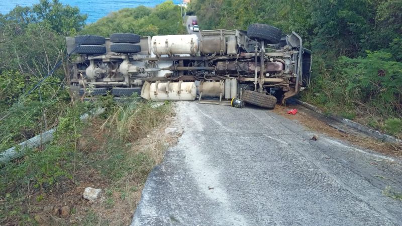 Cement truck topples @ Rogue's Bay