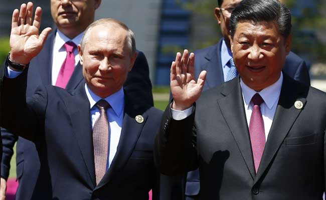 Xi Jinping, Putin Hail 'New Era' Of Ties In United Front Against West