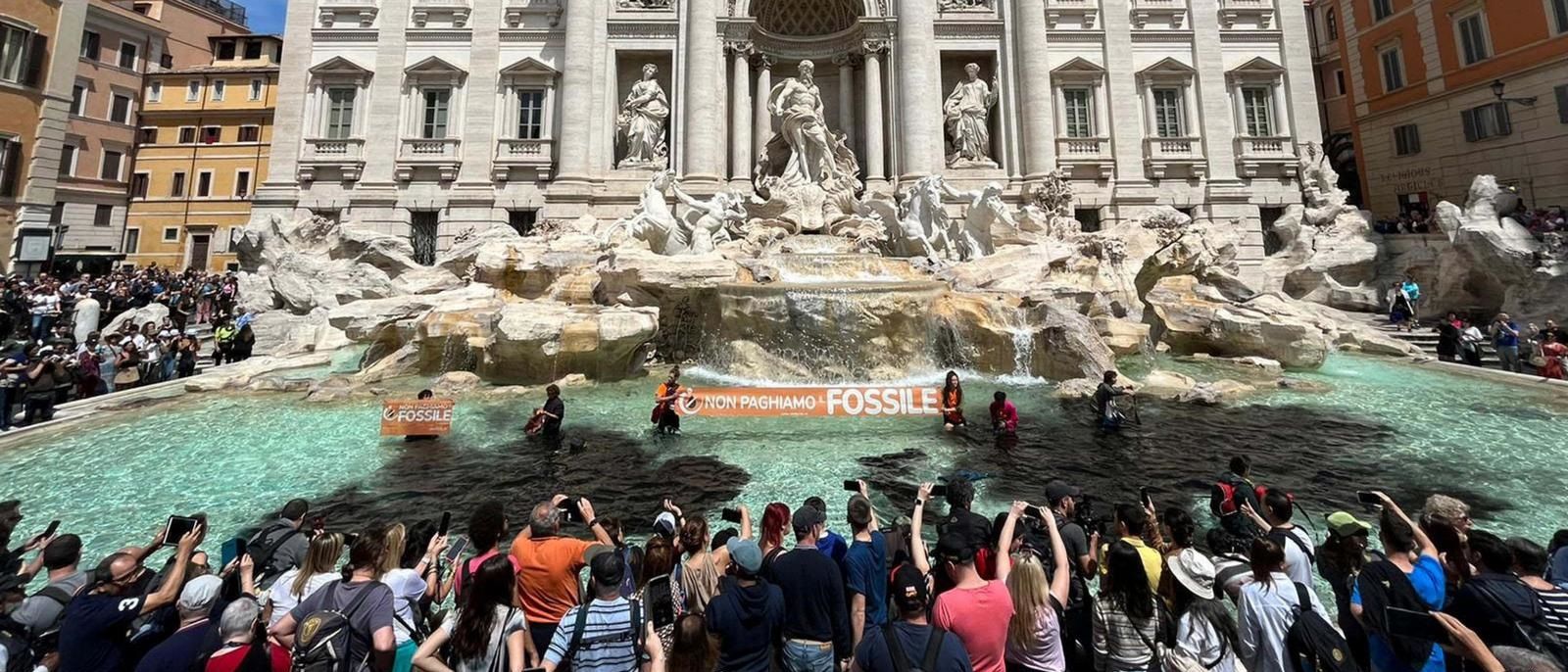 Rome's Iconic Trevi Fountain Water Turns Black In Climate Protest