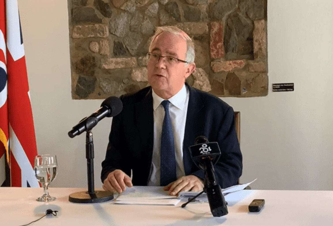 Deal with Belonger backlog, Governor urges